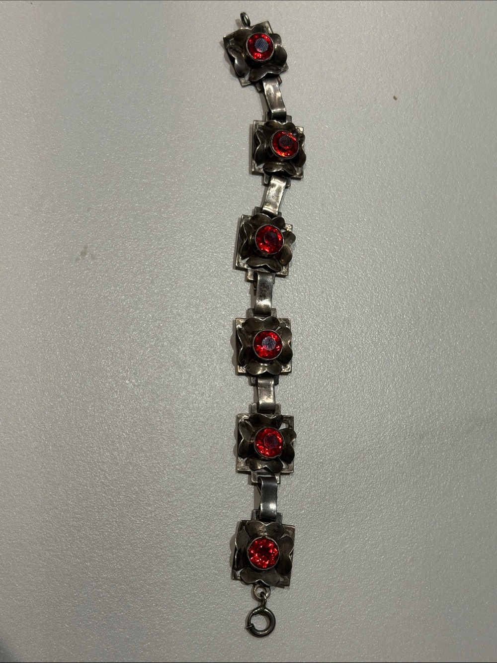 1940’s “Raffaele” Sterling Silver Floral Link Bracelet with Red Crystal Accents